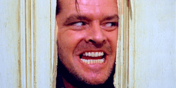 Jack Torrance smiling from a cracked door